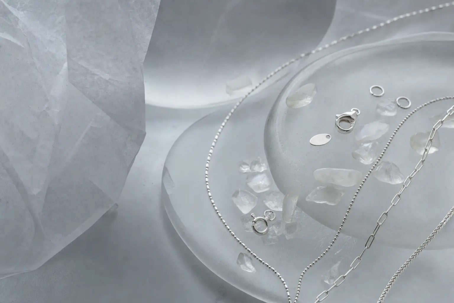Cool gray silver chain and component material study on frosted glass