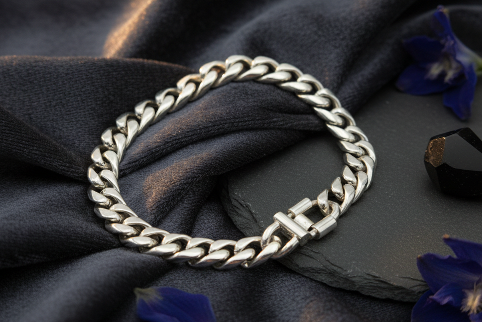 Silver bracelet on black satin