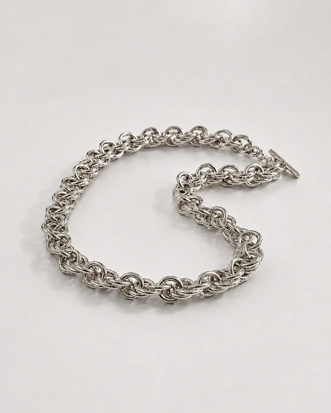 Silver chain bracelet photographed on a clean white surface